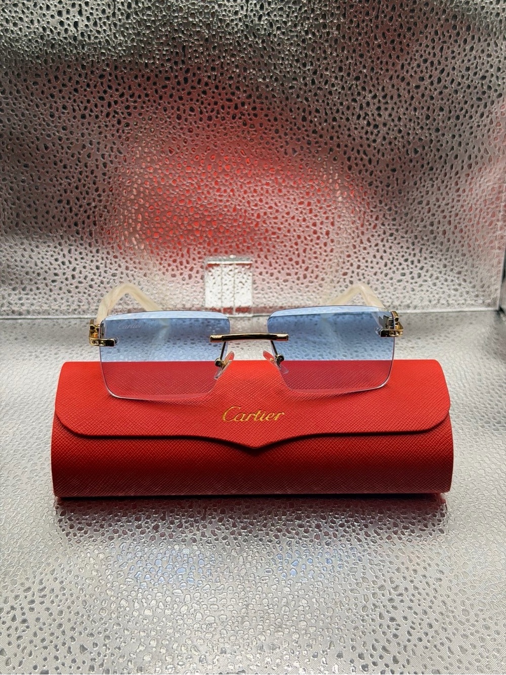 Cartier Rimless Sunglasses with Blue Gradient Lenses and Gold Accents
